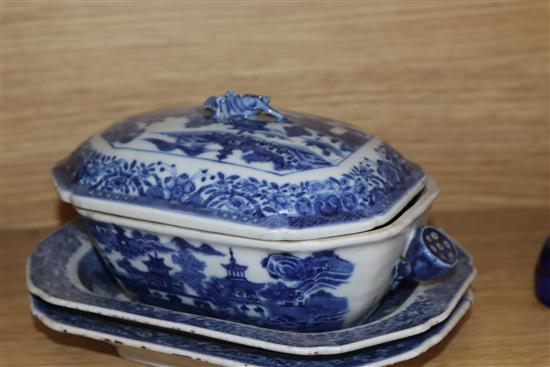 Four Chinese blue and white leaf-shaped plates, three matching rectangular serving dishes and a sauce tureen and cover (faults)